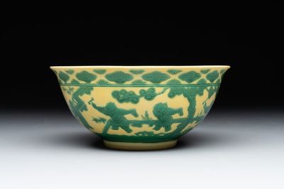 An imperial Chinese green-enamelled yellow-ground 'playing boys' bowl, Yongzheng mark and of the period