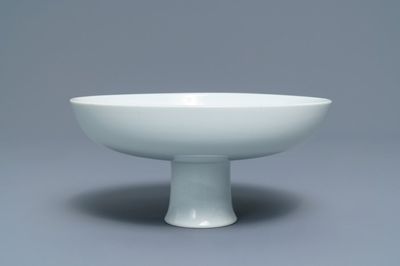 An imperial Chinese monochrome white stem cup, Qianlong mark and of the period