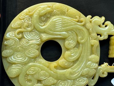 An imperial Chinese yellow jade 'dragon and phoenix' twin 'bi' disc, Qing — photo 13