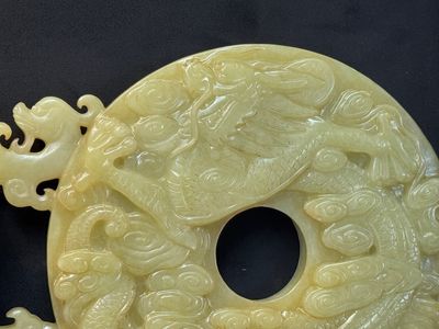 An imperial Chinese yellow jade 'dragon and phoenix' twin 'bi' disc, Qing — photo 17
