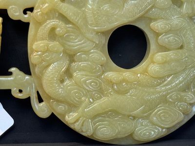 An imperial Chinese yellow jade 'dragon and phoenix' twin 'bi' disc, Qing — photo 18