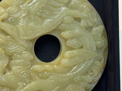 An imperial Chinese yellow jade 'dragon and phoenix' twin 'bi' disc, Qing — photo 19
