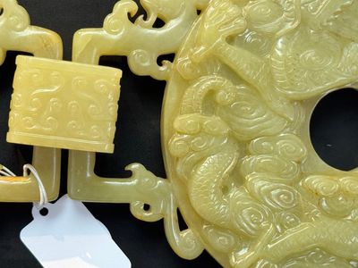 An imperial Chinese yellow jade 'dragon and phoenix' twin 'bi' disc, Qing — photo 20