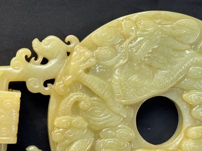 An imperial Chinese yellow jade 'dragon and phoenix' twin 'bi' disc, Qing — photo 21