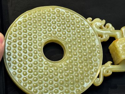 An imperial Chinese yellow jade 'dragon and phoenix' twin 'bi' disc, Qing — photo 7