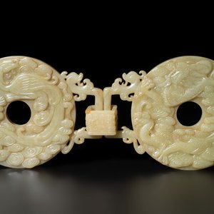 An imperial Chinese yellow jade 'dragon and phoenix' twin 'bi' disc, Qing — photo 1