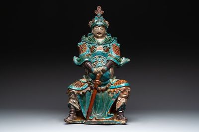 An impressive and fine Chinese sancai-glazed biscuit Guandi, Ming, 17th C.