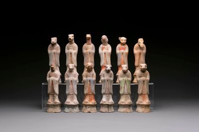 An impressive set of 12 Chinese cold painted terracotta zodiac figures, Ming