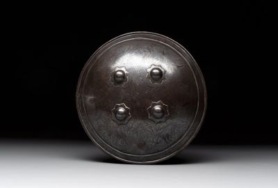 An Indo-Persian parcel-gilt and silver inlaid shield or dhal, 18/19th C.