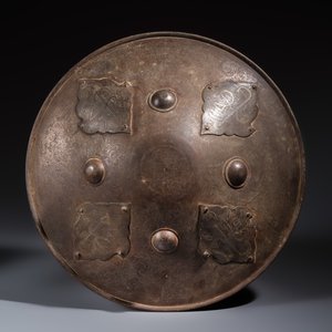 An Indo- Persian silver-damascened steel 'Dhal' shield with calligraphic design — photo 1