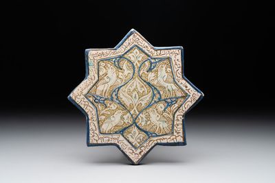 An intact Kashan lustre-glazed star tile, Persia, 13/14th C.