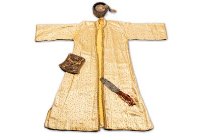An Iranian gold-thread-embroidered silk caftan, a hat, a coin bracelet and a Koran holder, 19th C.