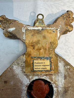 An Italian carved wood and coral- and turquoise-decorated reliquary containing a relic ex cineribus of Saint Teresa of Jesus, early 20th C. — photo 13