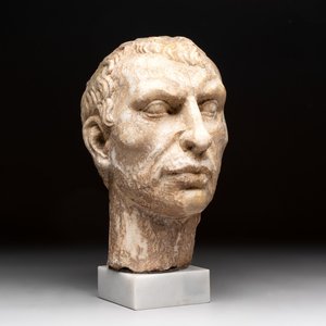 An Italian Grand Tour marble sculpture of a man's head in Roman style, probably after a bust of Caesar, 19th C. — photo 1
