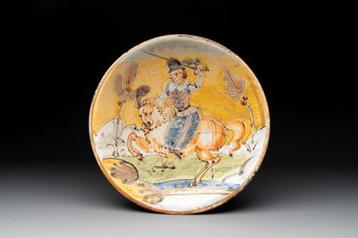 An Italian maiolica dish with a swordsman on horse, Montelupo, early 17th C.
