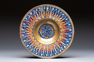 An Italian maiolica lustreware deep plate, Gubbio, 16th C.