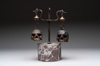 An Italian 'vanitas' or 'memento mori' composition with skulls and forged iron mount, 18/19th C.