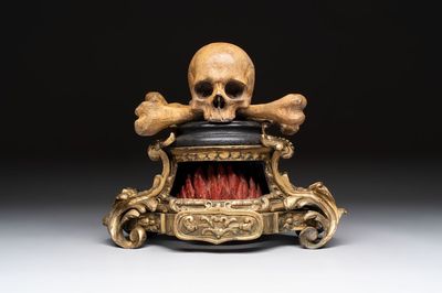 An Italian 'vanitas' or 'memento mori' skull with wooden crossbones on gilt-bronze base, 18/19th C.