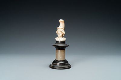An ivory bust of a lady with a raised hairdress, 19th C.