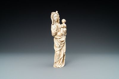 An ivory figure of a Madonna with child, probably France, 19th C.