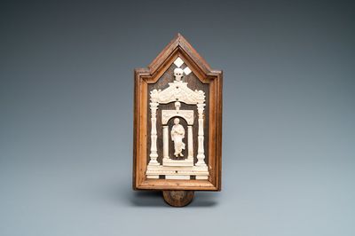 An ivory Madonna retable in wooden frame, 17/18th C.