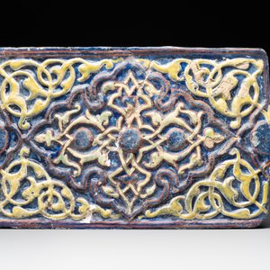 An Kashan lustre-glazed star tile and a rectangular moulded ornamental tile, Persia, 13/14th C. — photo 2