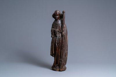 An oak figure of an angel holding the Instruments of the Passion, Brabant region, Southern Netherlands, early 15th C.