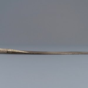 An Ottoman silver-mounted Damascus steel 'yatagan' sword in its leather sheath, Turkey, 19th C. — photo 6