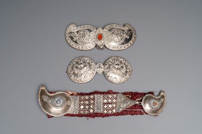 An Ottoman silver-plated wedding belt and two pairs of silver and copper buckles, 19th C.