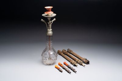 An Ottoman white-metal and Tophane pottery-mounted cut-crystal hookah, with three hose tubes and three amber-mounted mouthpieces, Turkey, 19th C.