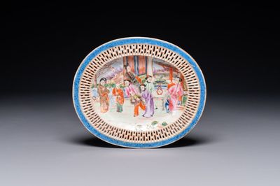 An oval Chinese Canton famille rose dish with a reticulated border, 19th C.