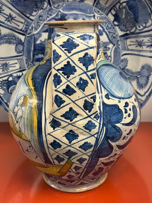 An unusual large polychrome Italian maiolica two-handled 'Cupid and Psyche' wet drug jar inscribed 'Rodomel', probably Rome, early 16th C. — photo 5