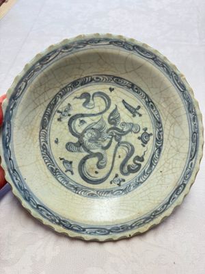 An unusual Chinese blue and white celadon-back 'Buddhist Lion' plate, Ming — photo 1