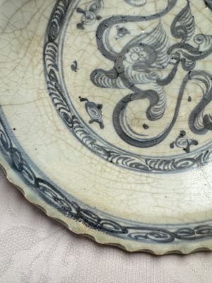 An unusual Chinese blue and white celadon-back 'Buddhist Lion' plate, Ming — photo 2
