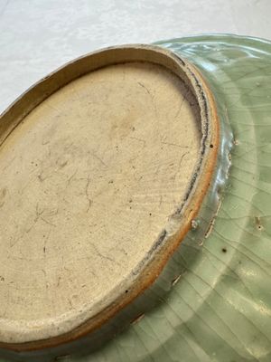 An unusual Chinese blue and white celadon-back 'Buddhist Lion' plate, Ming — photo 9