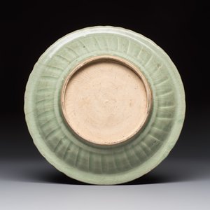 An unusual Chinese blue and white celadon-back 'Buddhist Lion' plate, Ming — photo 2