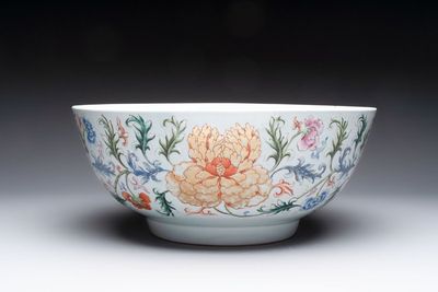 An unusual Chinese famille rose punch bowl with floral relief design, Qianlong