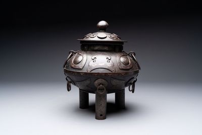 An unusual Chinese gold- and silver-inlaid iron censer and cover, Xuande mark, Ming