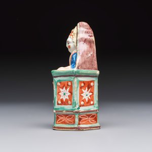 An unusual polychrome Dutch Delft model of a child in a highchair, 18th C. — foto 3