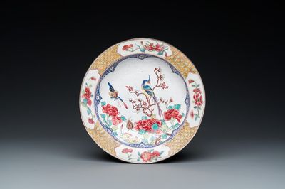 Assiette à décor d'un papillon et d'un faisan en émaux de Canton au dos en rouge de rubis, Yongzheng