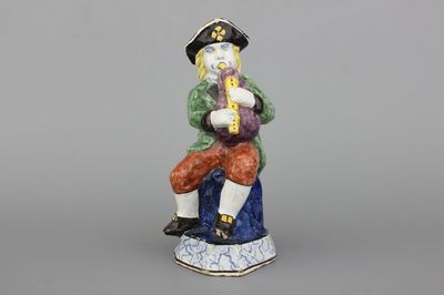 Beeldje van een doedelzakspeler in Delfts, ca 1800