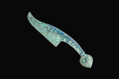 Couteau en bronze au pommeau zoomorphe, Chine, Période des Royaumes Combattants