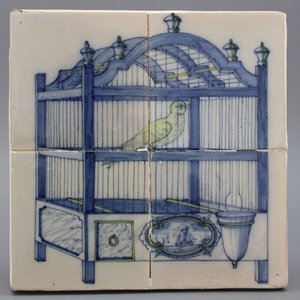 Delfts blauw en geel tegeltableau, met vogelkooi, 19e eeuw — foto 1