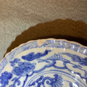 Dix-sept tasses et vingt-deux soucoupes en porcelaine de Chine en bleu et blanc à décor floral, Kangxi — photo 19
