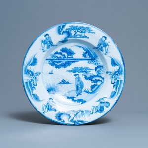 Een blauw-witte Delftse chinoiserie schotel met medaillons achterop, eind 17e eeuw — foto 1