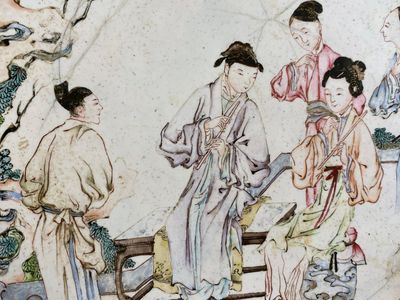 Een Chinees bord met fluitspelers in Canton email met robijnrode achterkant, Yongzheng — foto 10