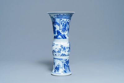 Een Chinese blauw-witte 'gu' vaas met figuratief decor, Kangxi