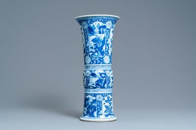Een Chinese blauw-witte 'gu' vaas met landschaps- en florale medaillons, Kangxi