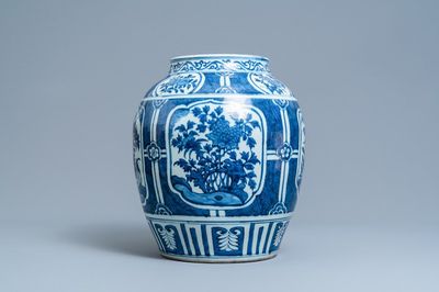Een Chinese blauw-witte vaas met florale panelen, Wanli