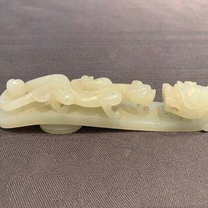 Een Chinese celadon jade gordelhaak, 18/19e eeuw — foto 12